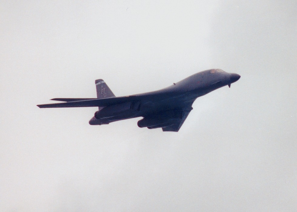 B1 making fast pass with wings swept