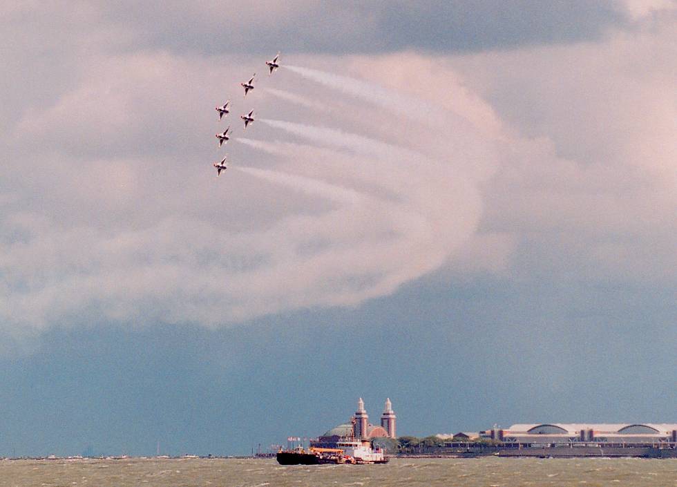 photo #601: all the Thunderbirds banking together with Navy Pier in the background