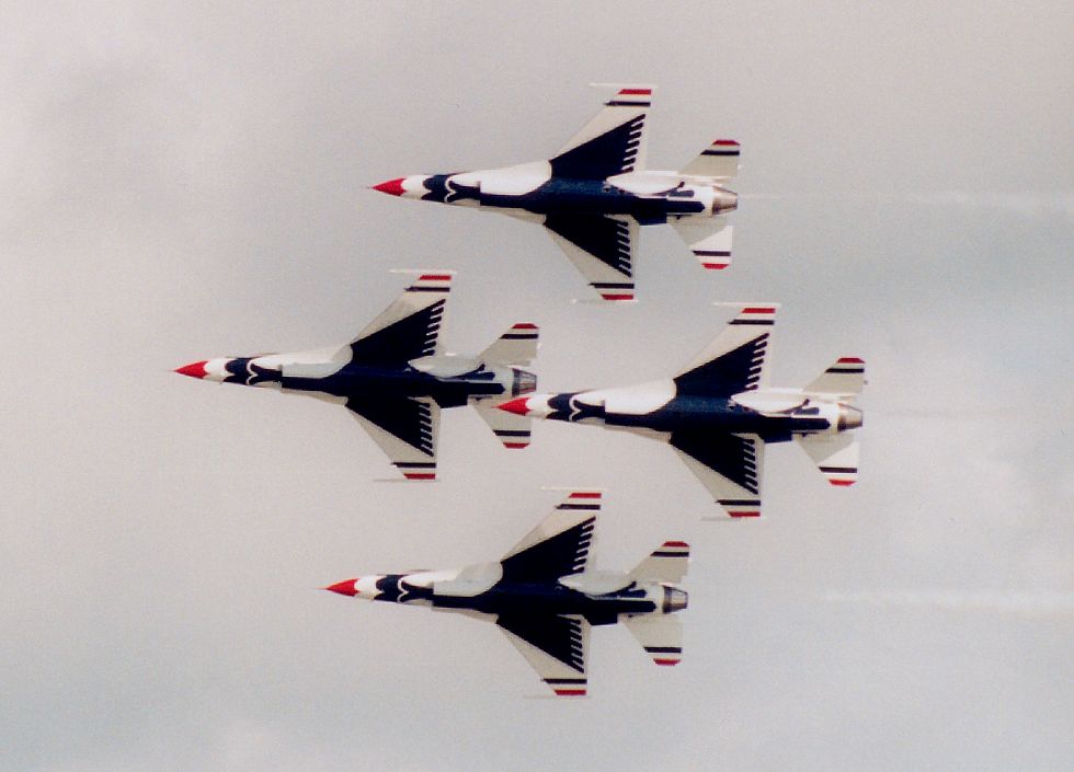 photo #58:  four Thunderbirds banking in tight diamond formation under view