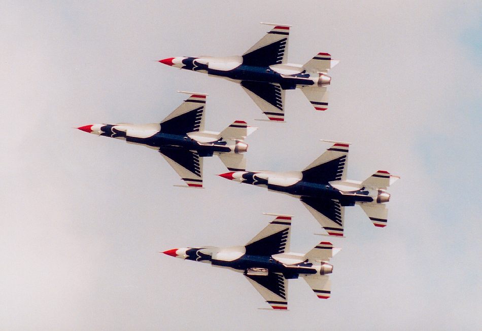 photo #63:  four Thunderbirds banking in tight diamond formation with wheels almost totally pulled up