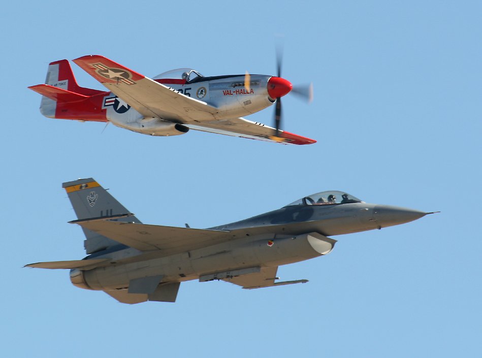 F-16 Fighting Falcon in formation with a P-51D Mustang