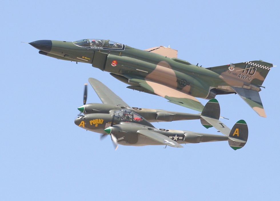 F-4 Phantom and P-38 Lightning in formation   (click here to open a new window with this photo in computer wallpaper format)