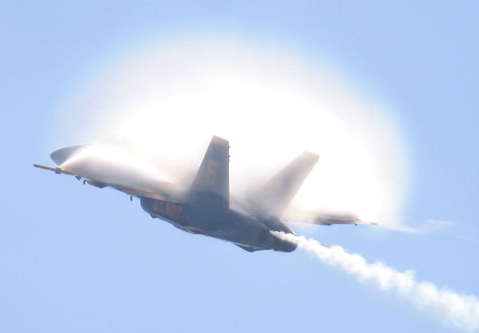 Blue Angel F-18 Hornet pulling vapor