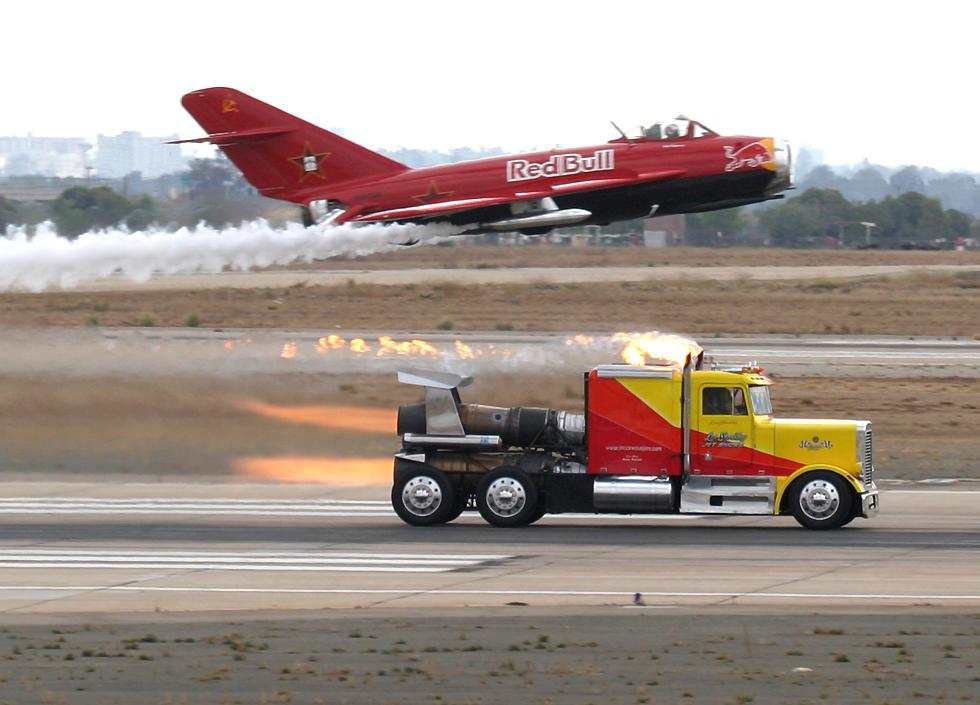 Shockwave jet truck 'racing' a MiG 17