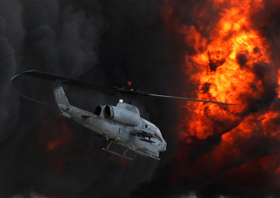 AH-1 Super Cobra and the Wall of Fire   (click on this photo to open a new window with this photo in computer wallpaper format)