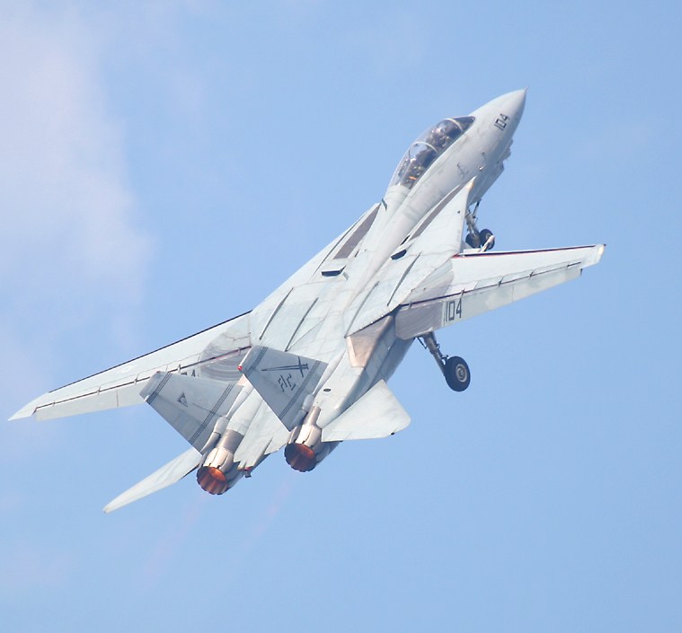 F-14 climbing after takeoff with afterburner on and landing gear extended