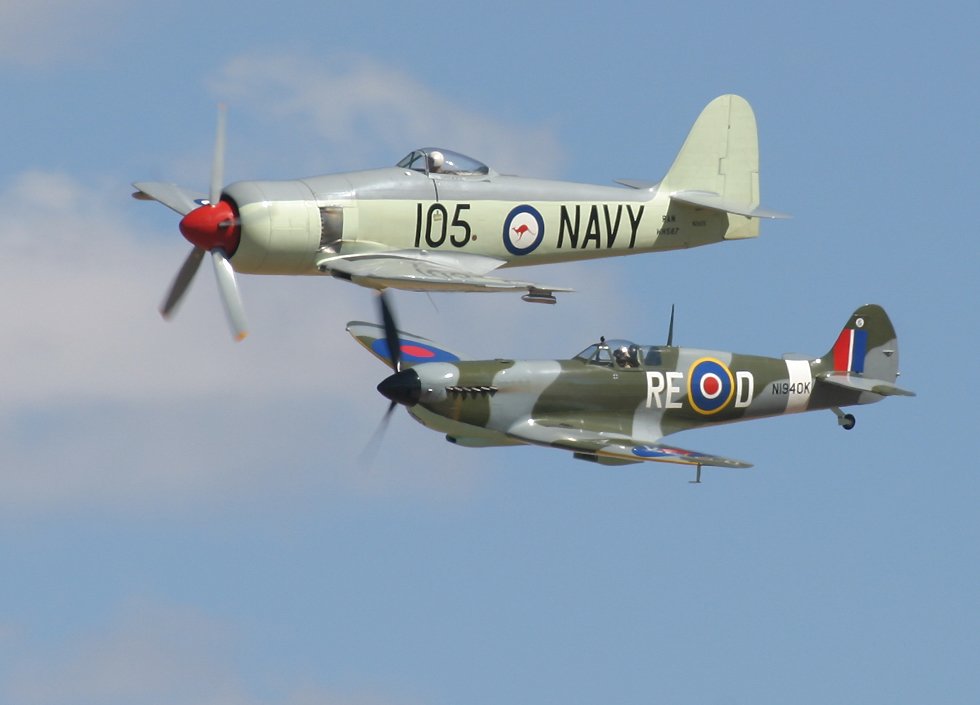 authentic Sea Fury and replica Spitfire flying in formation (click here to open a new window with this photo in computer wallpaper format)