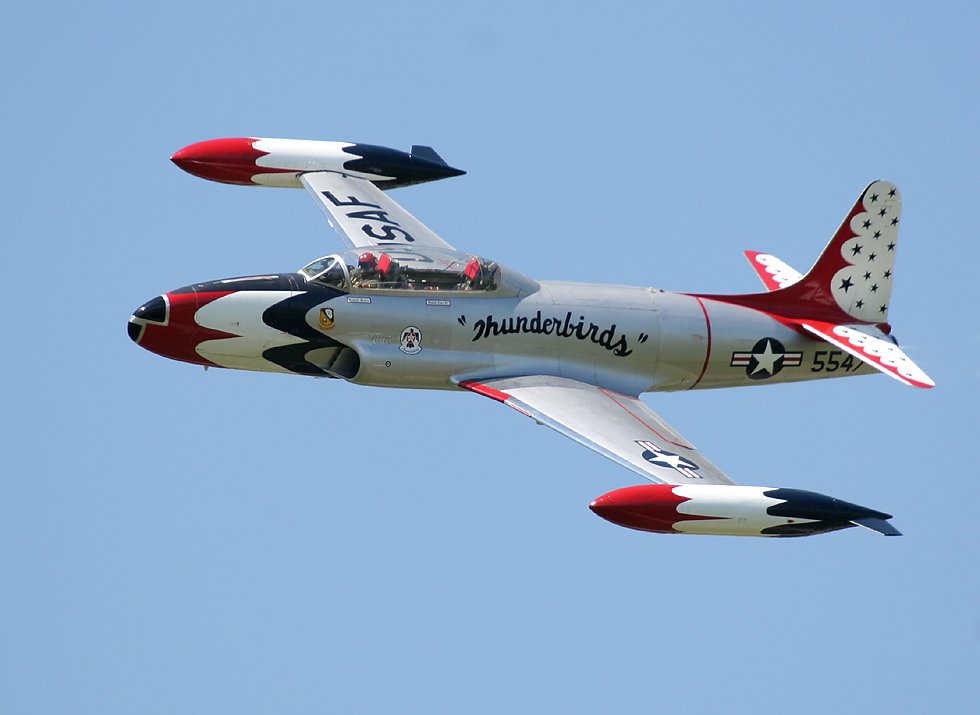 T-33 Shooting Star in USAF Thunderbirds colors   (click here to open a new window with this photo in computer wallpaper format)