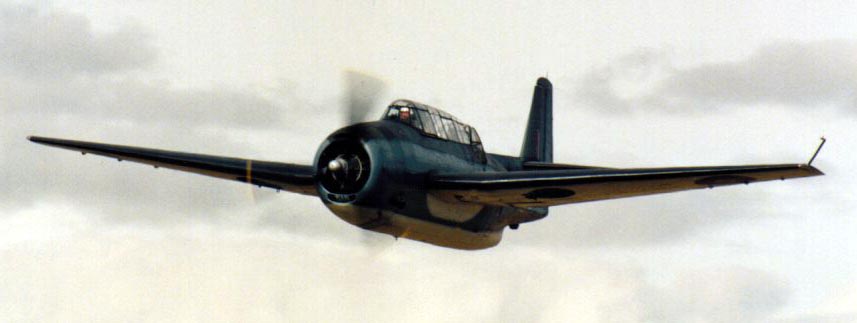 Front view of Grumman Avenger flying level.