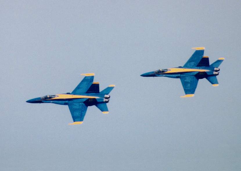 two Blue Angels banking together