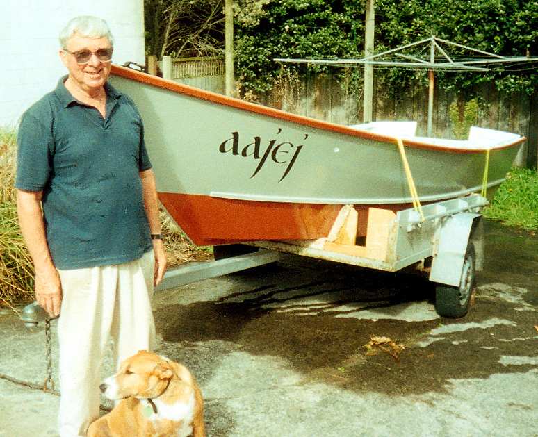 my father with his dog Imshi and the boat Aajej, which he built