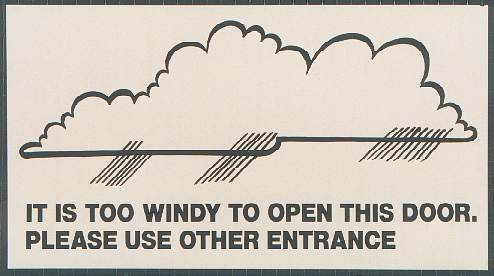 sign saying 'It is too windy to open the door'