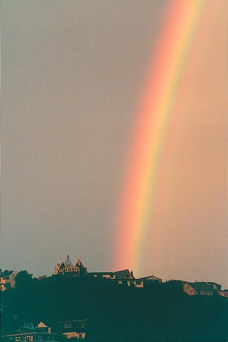 rainbow striking a house