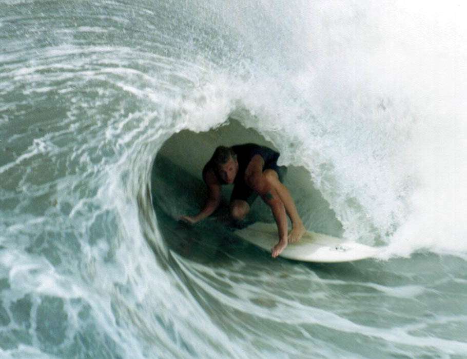 surfer inside a barrel