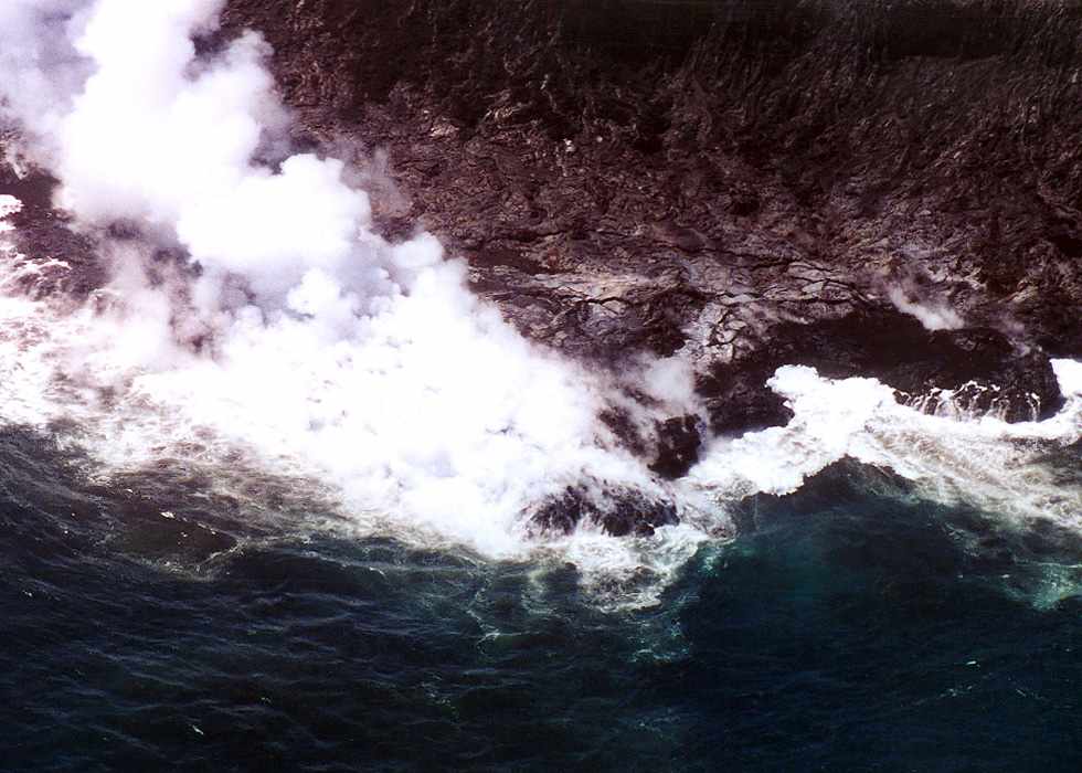 lava turning seawater to steam as it hits the ocean