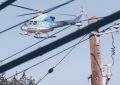 NYPD helicopter flying among power lines