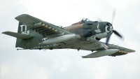 A1 Skyraider photographed at the Oshkosh airshow 2003 using a Canon 1Ds digital camera and Canon 100-400mm image stabilized lens set to 330mm  (1/500th second, f5.6, ISO 160)