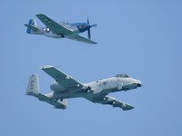 A10 and P51 photographed at the Chicago Air and Water Show 2003 using a Canon 1Ds digital camera and Canon 100-400mm image stabilized lense