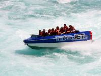 commercial Huka Falls jetboat photographed in February of 2003 using a Canon D60 digital camera and Canon 100-400mm lens