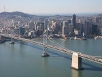 San Francisco with the Bay Bridge photographed in December of 2011 using a Canon 5D camera and Canon 28-135mm image stabilized lens set to 75mm (1/250th second, f9.5, ISO 200)